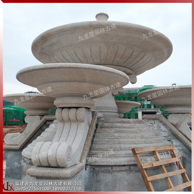 黃銹石石雕噴泉圖片